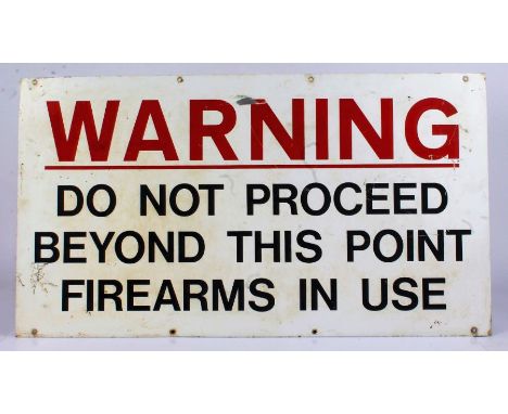 Enamel sign, "Warning do not proceed beyond this point firearms in use", 81cm x 45cm
