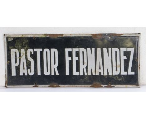 Enamel sign, the black ground with white lettering "PASTOR FERNANDEZ", 44.5cm x 18cm