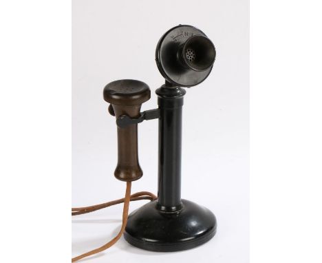 Early 20th Century candlestick telephone, with bakelite reciever, stamped W-29 4001 No.1, the base stamped 1549A, 32cm high