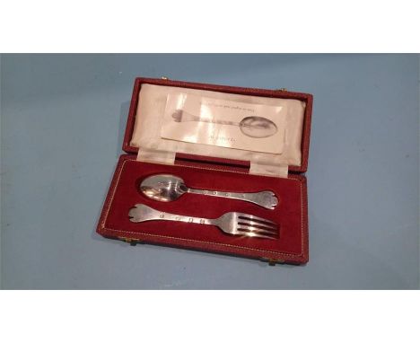 A cased silver reproduction spoon and fork