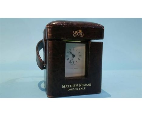 A miniature traveling carriage clock in fitted case, the dial signed Matthew Norman