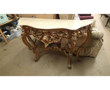 A modern gilt console table