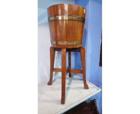 R. A. Lister and Co. barrel planter and stand