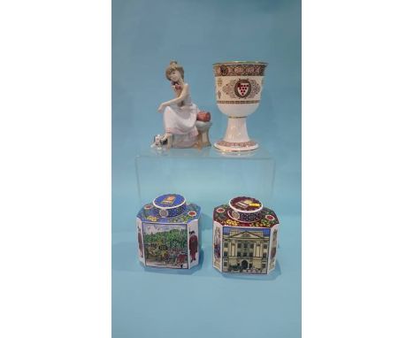 A Lladro figure, two Royal Worcester tea caddies and a Worcester Cathedral appeal goblet. (4)