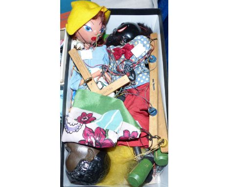 Three Pelham puppets:  green witch and 2 others; a black boy glove puppet