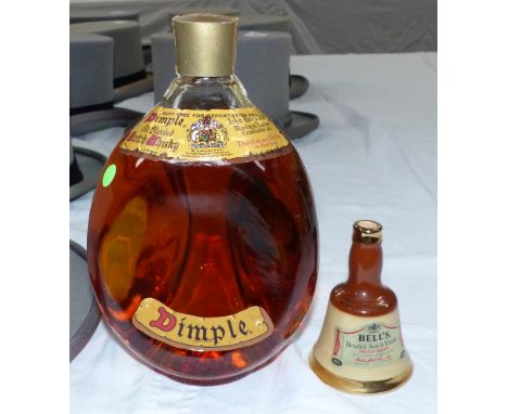 A Dimple bottle of scotch whiskey; a Bell's small whiskey decanter, seal intact 