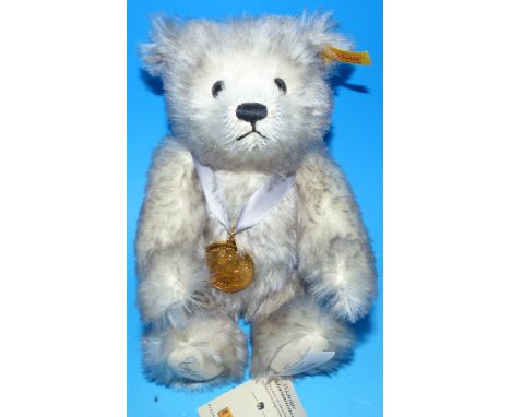 A Steiff teddy bear with original box and label:  "Capricorn", limited edition