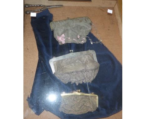 A silver ID bracelet, 3 EPNS chain bags, a pair of glove stretchers