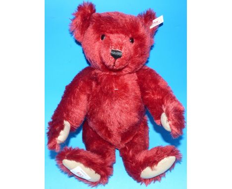 A Steiff teddy bear with original box and label:  "Burgundy 40"