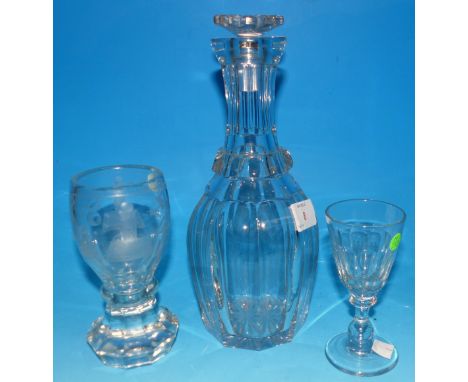 A 19th century Masonic firing glass on faceted base; a slice cut decanter and wine glass