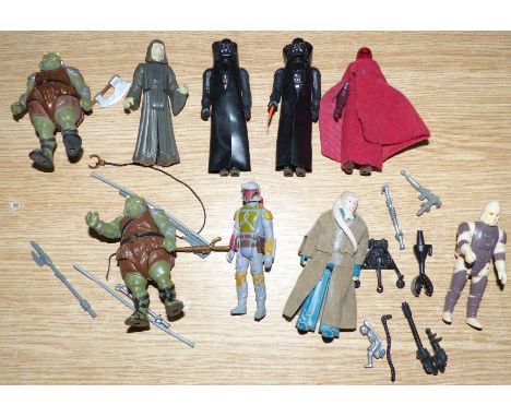 A selection of 1980's Kenner Star Wars 'Bad Guys' action figures including Darth Vader (with vinyl cloak and telescoping ligh