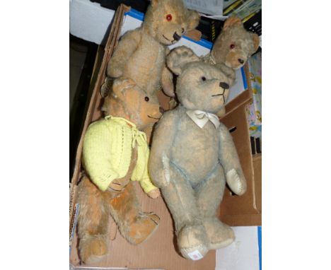 Four early / mid 20th century Teddy bears in the Steiff style (worn)