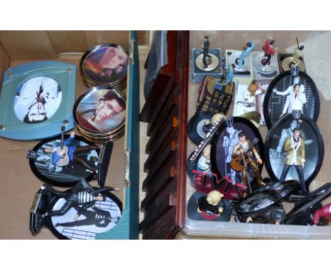 A collection of Elvis limited edition figurines, china plates etc