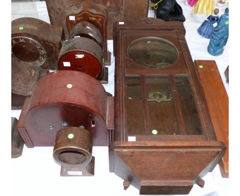 An oak Vienna clock case; a selection of mantel clock cases