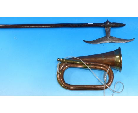 An antique tribal axe, 32½"; a copper and brass bugle