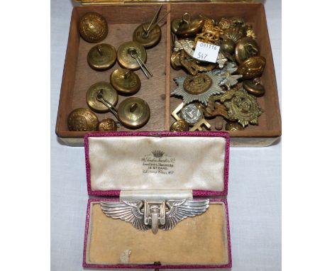 A WWII period USAAF badge, stamped 'Sterling', 3"; various British Army cap badges and buttons
