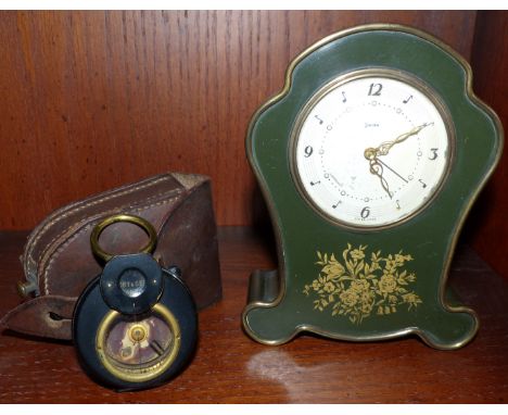 A prismatic style compass by Gregory & Seeley Ltd, Strand, London; a Swiza musical mantel clock