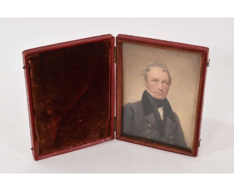 Early 19th century portrait miniature on paper of a gentleman, rectangular, 11 x 7.5cm, in folding leather case