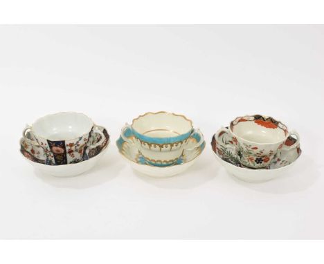 Three Worcester chocolate cups and saucers, circa 1770, the first decorated in the Queen's pattern, the second Kempthorne (al