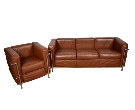 Corbusier style leather and chrome sofa and ensuite armchair, each of square form with angular frame, the sofa approximately 