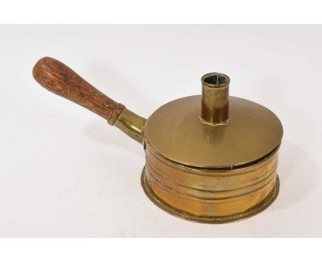 18th century sheet brass combination tinderbox / candlestick, with removable cover and turned ash handle, 23cm long. Provenan