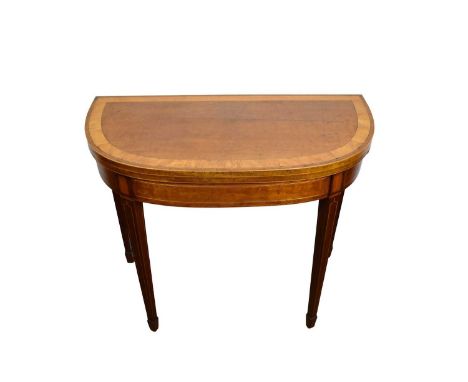 Regency satinwood crossbanded card table, with D-shaped fold over top raised on square tapered legs and spade feet, 89cm wide