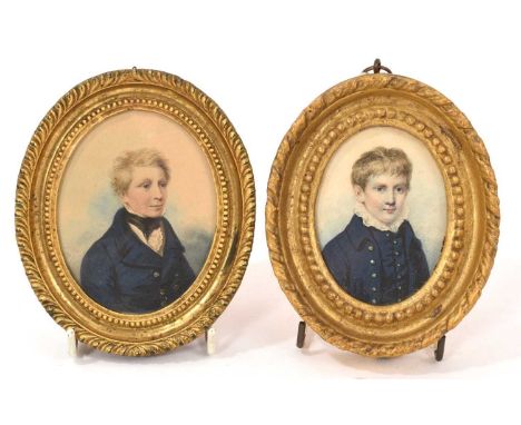 Pair of 19th century portrait miniatures on paper of boys in blue coats, possibly brothers, each oval, 9 x 7cm, in similar gl