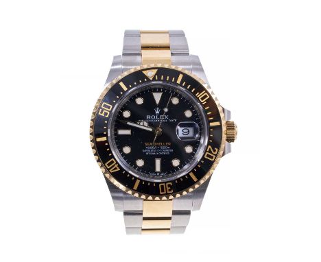 Rolex Sea-Dweller Oystersteel and yellow gold chronograph wristwatch, model 126603, the black enamel dial with luminous hour 