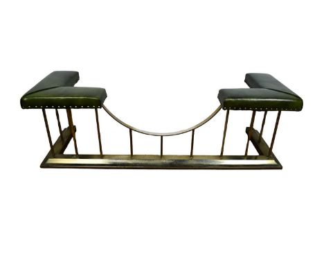 Brass and leather club fender, typical form with stud closed green leather seat raised on twisted supports, total dimensions 