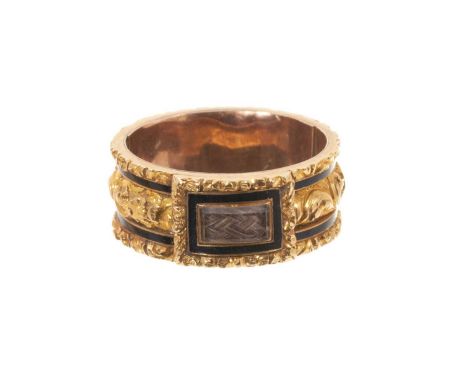 George IV gold and black enamel mourning ring, the wide gold band with glazed hairwork plaque and foliate gold borders, inscr