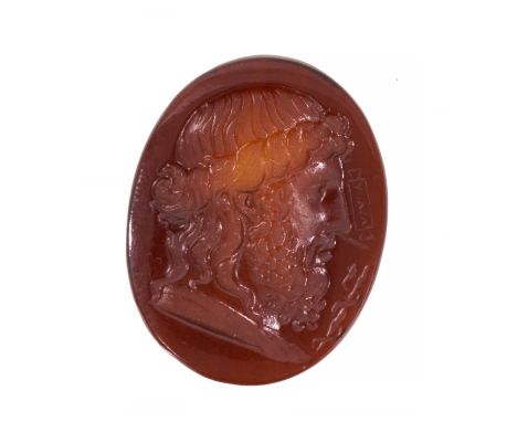 Antique carved intaglio depicting a classical male bust in profile, signed, 24mm x 19mm.Excellent condition, no damage, weigh