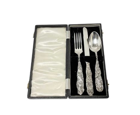 Tiffany silver christening set, comprising Knife, fork and spoon, with nursery rhyme decoration, in a fitted case, reverses s