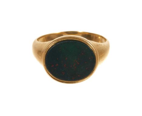 Late Victorian 18ct gold and bloodstone signet ring with oval bezel on tapered gold shank, ring size approximately R.Good con