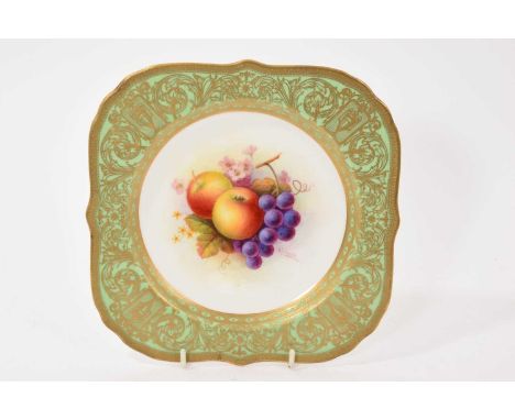 Royal Worcester square plate, painted with fruit by Albert Schuck, on a green and gilt ground, marked to base, date code for 