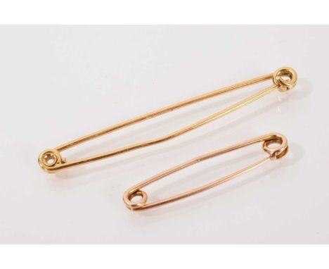 18ct gold tie pin (London 1988), 65mm, and one other yellow metal tie pin, 40mm (2)18ct gold tie pin weighs 4.5 grams Yellow 