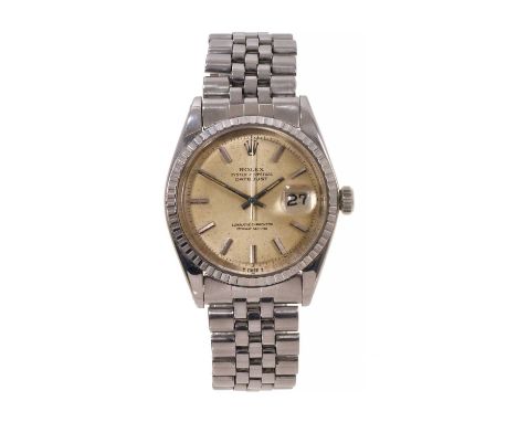 Rolex Oyster Perpetual Datejust stainless steel wristwatch with a circular champagne coloured dial, silvered baton markers an