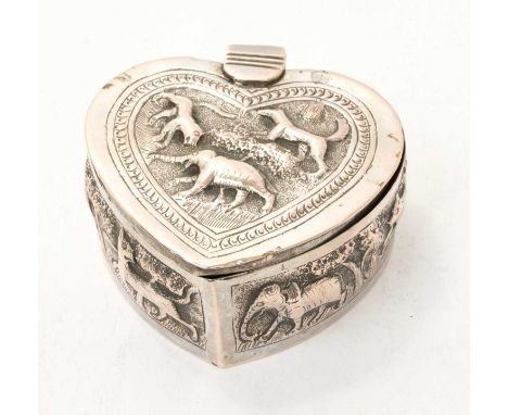 Indian silver trinket box in the form of a heart, with hinged cover and overall embossed decoration of animals in the jungle 