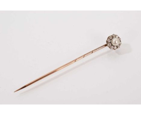 Victorian diamond and pearl stick pin with a 4.25mm button pearl surrounded by ten old cut diamonds in gold claw setting Good