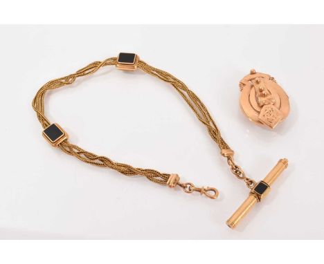 19th century French gold and black onyx watch chain, the three strand chain with two black onyx panel sliders and a T-bar ter