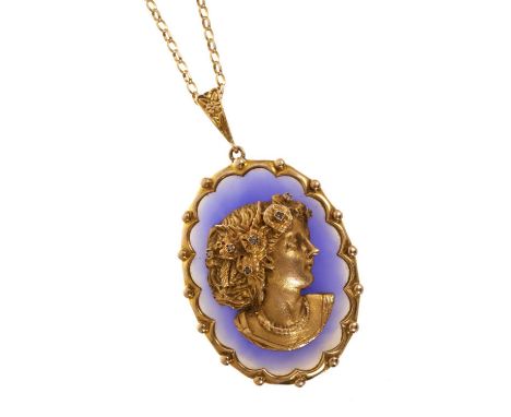 Gold and blue chalcedony cameo pendant with an applied gold female bust, her hair garland set with seven brilliant cut diamon