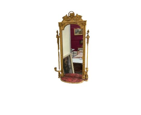 Regency gilt pier mirror of slender form, the lower shelf flanked by pair of candlearms, 92 x 43cm