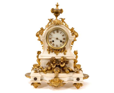 19th century French alabaster and ormolu mounted mantel clock with urn surmount, cherub, dolphin and fountain decoration, Fre