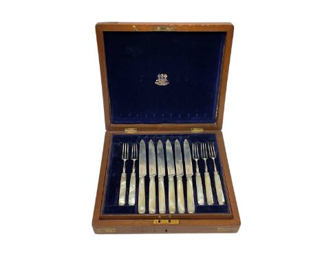 Cased set of twelve pairs Victorian silver fruit knives and forks, with mother of pearl handles, one fork lacking (London 188