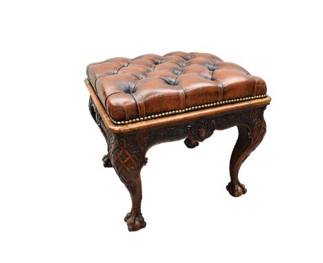 Fine quality solid walnut stool in the 18th century manner, button leather upholstered, raised on acanthus carved frieze and 