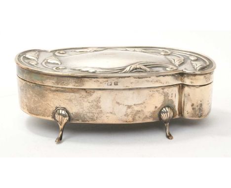 Early 20th century silver Art Nouveau style trinket box of shaped form, with silk lining and hinged cover, with raised floral
