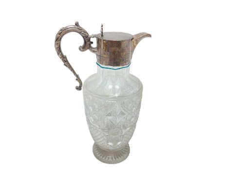 Early 20th century silver mounted cut glass claret jug of baluster form, on a circular base, with hinged silver cover, now de