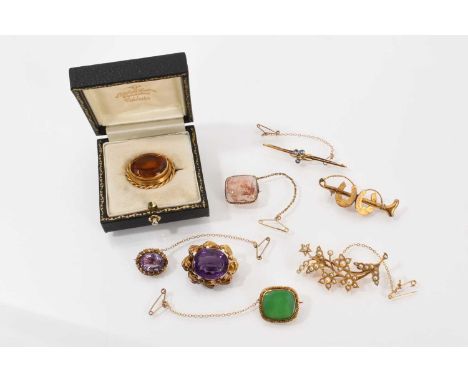 Group of eight antique brooches to include a gold seed pearl floral spray brooch with star-shaped flowers, two oval amethyst 