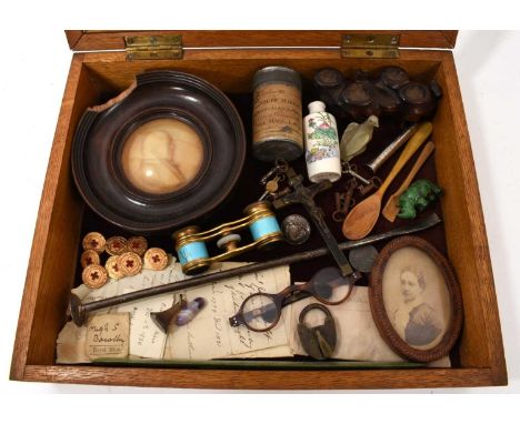 Small collectors' cabinet of curios and vertu items, including Georgian wax portrait, Georgian horn spectacles, silver plated