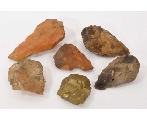 Collection of five Neolithic hand axes, two with faint pen collectors' inscriptions, the largest 15cm long, together with a m