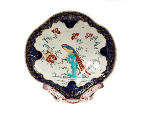 A Worcester porcelain shell moulded dessert dish, circa 1770, decorated in enamels with the Sir Joshua Reynolds pattern, with